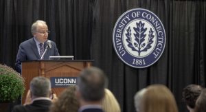 Dean Hritcko speaks to pharmacy students during their professionalism ceremony in 2019. (UConn Photo)
